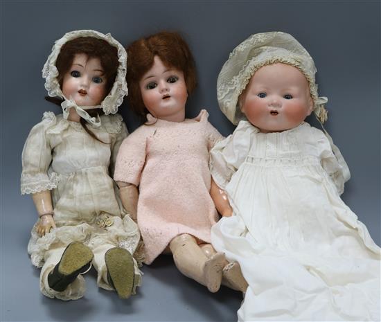 Three bisque head dolls